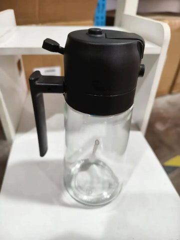 "Kitchen oil spray bottle for even and controlled oil distribution, perfect for cooking with less mess and waste."
