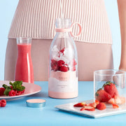Portable fresh fruit blender for making smoothies and juices on the go, compact, rechargeable, and perfect for quick, mess-free blending.
